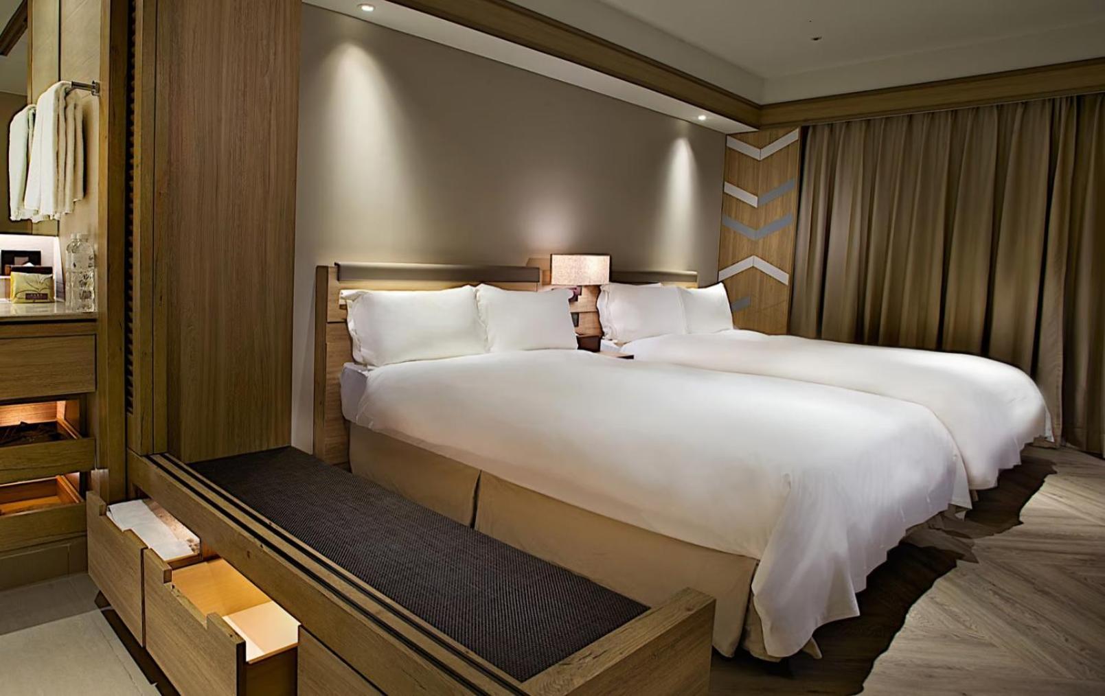 โฮเต็ล รอยัล ชิห์เพ็น Hotel Wenquan ภายนอก รูปภาพ A bedroom at the hotel