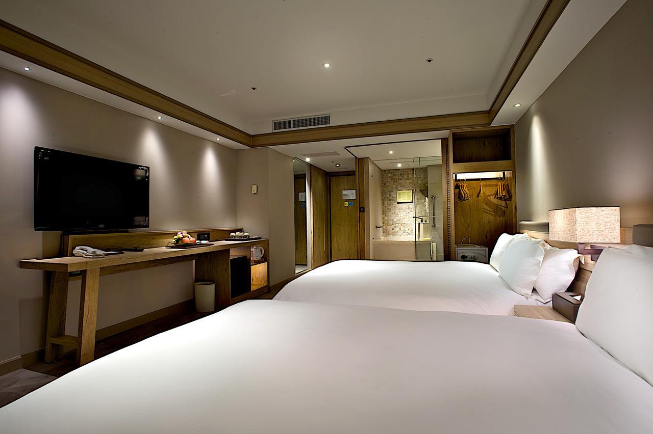 โฮเต็ล รอยัล ชิห์เพ็น Hotel Wenquan ภายนอก รูปภาพ A room at the hotel