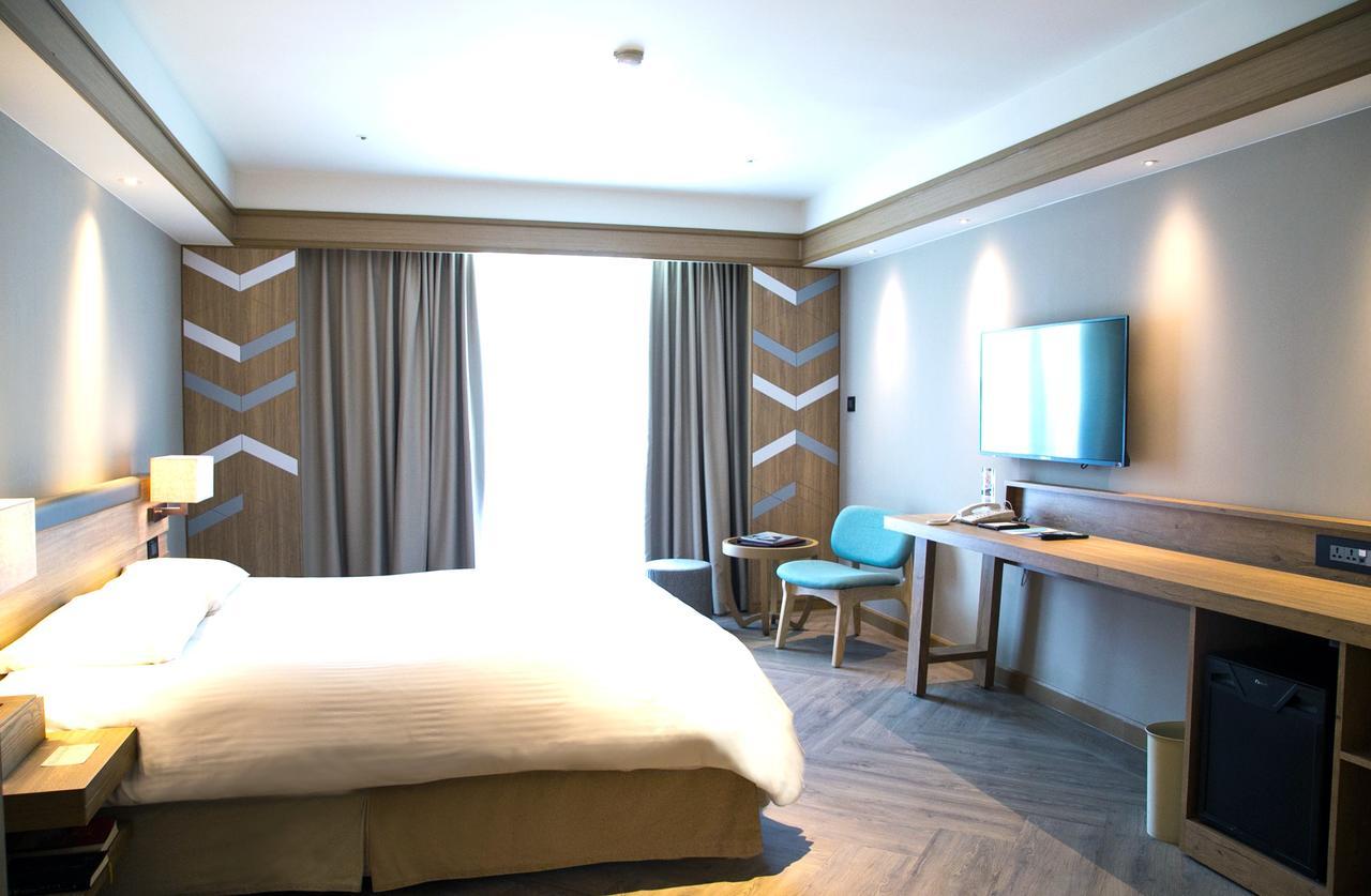 โฮเต็ล รอยัล ชิห์เพ็น Hotel Wenquan ภายนอก รูปภาพ A room at the hotel